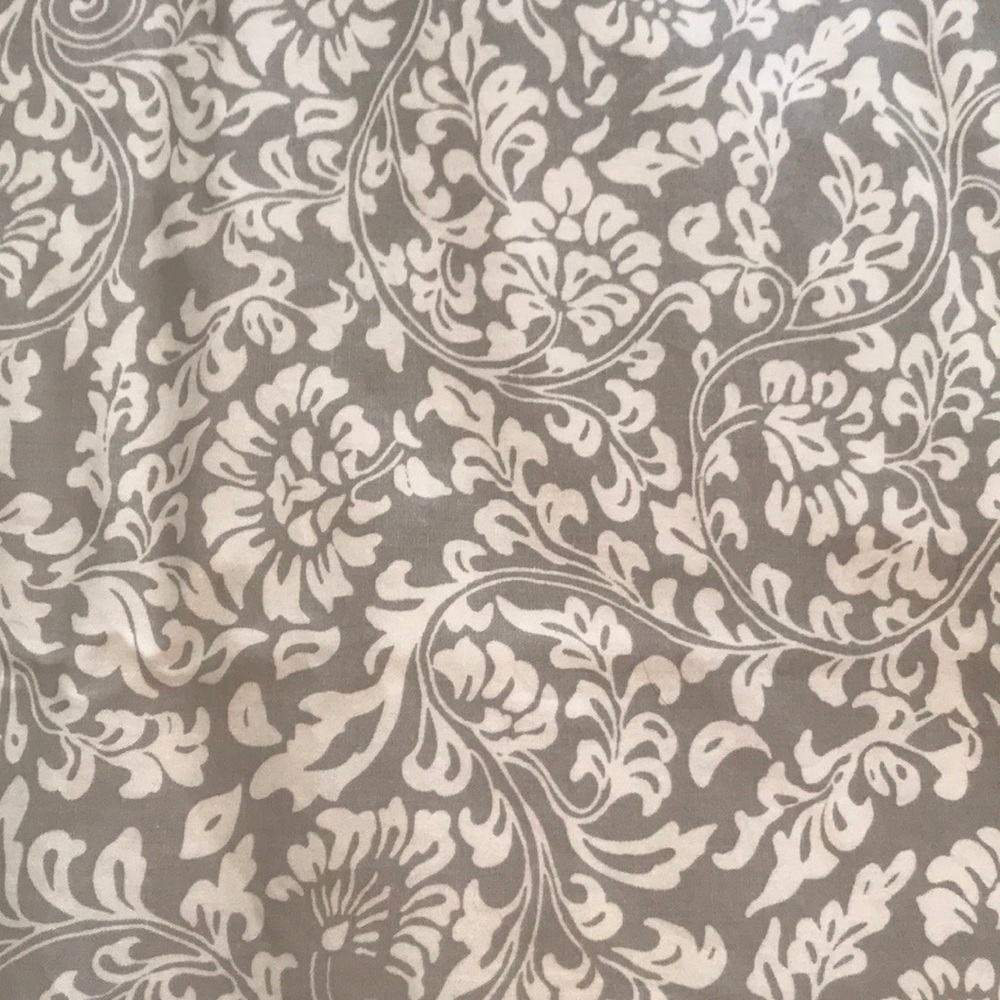Gray and white curtains.